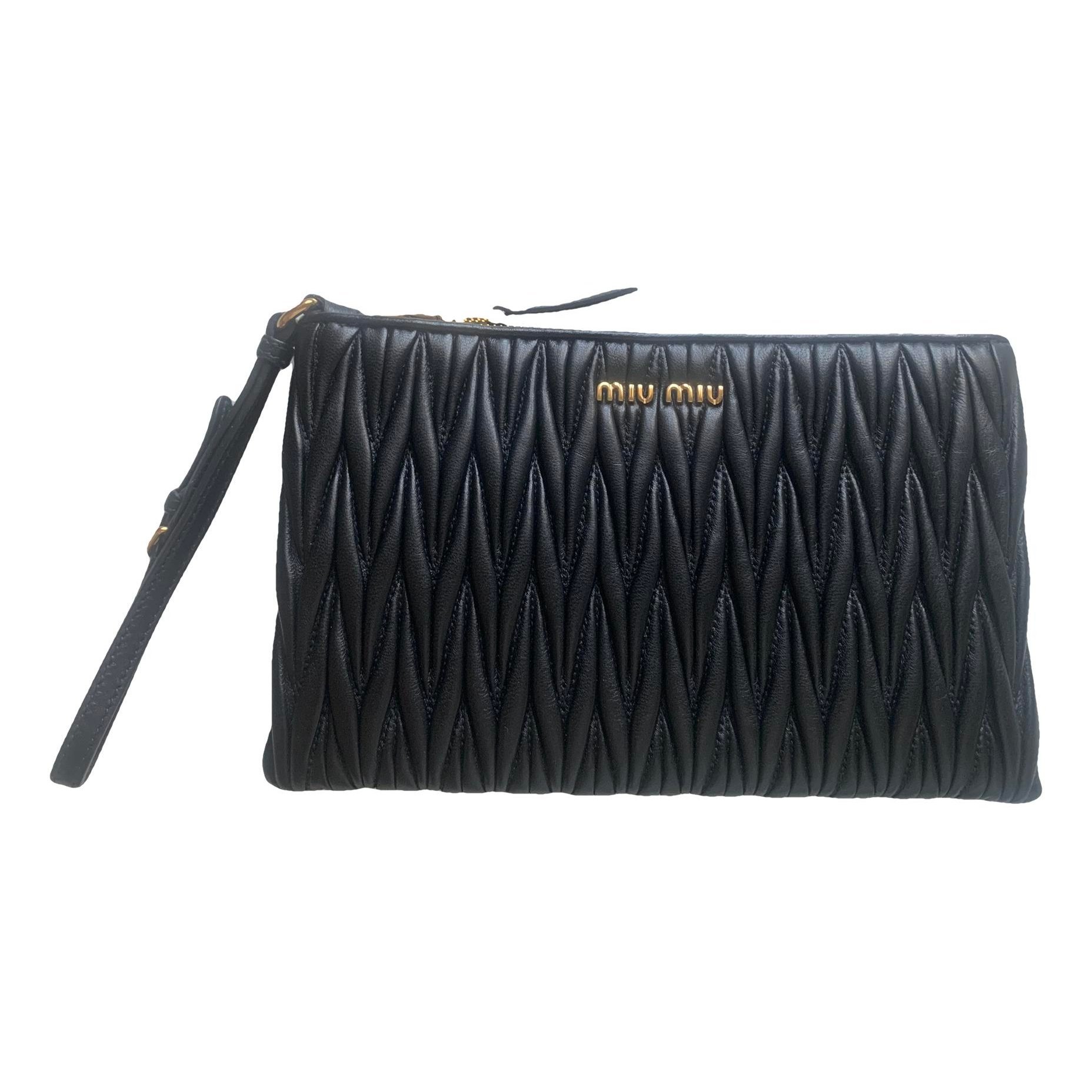 Matelassé leather clutch bag