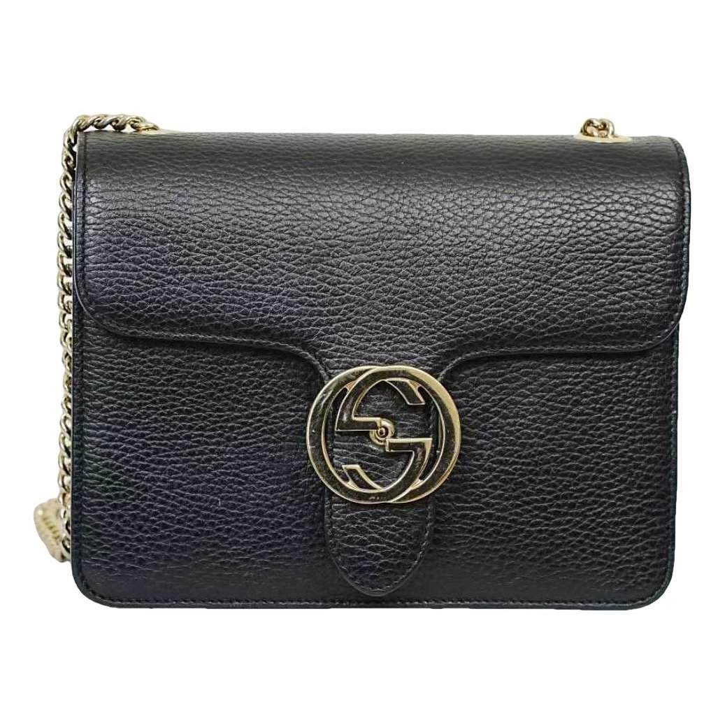 Interlocking leather handbag
