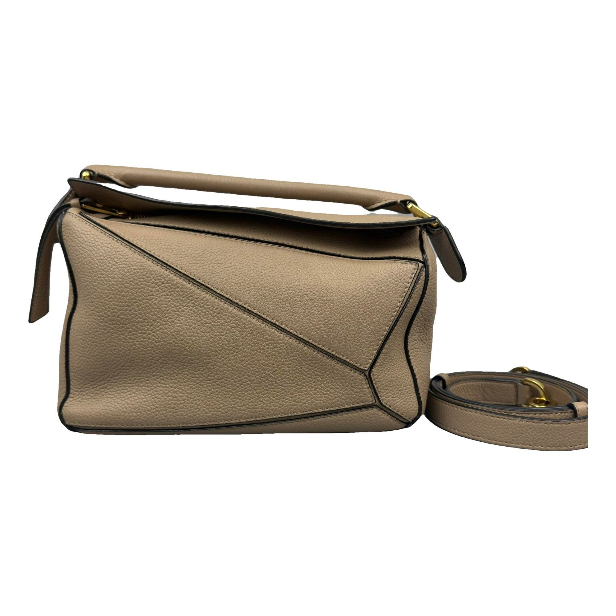 Puzzle leather handbag