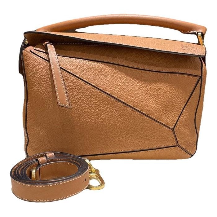 Puzzle leather handbag