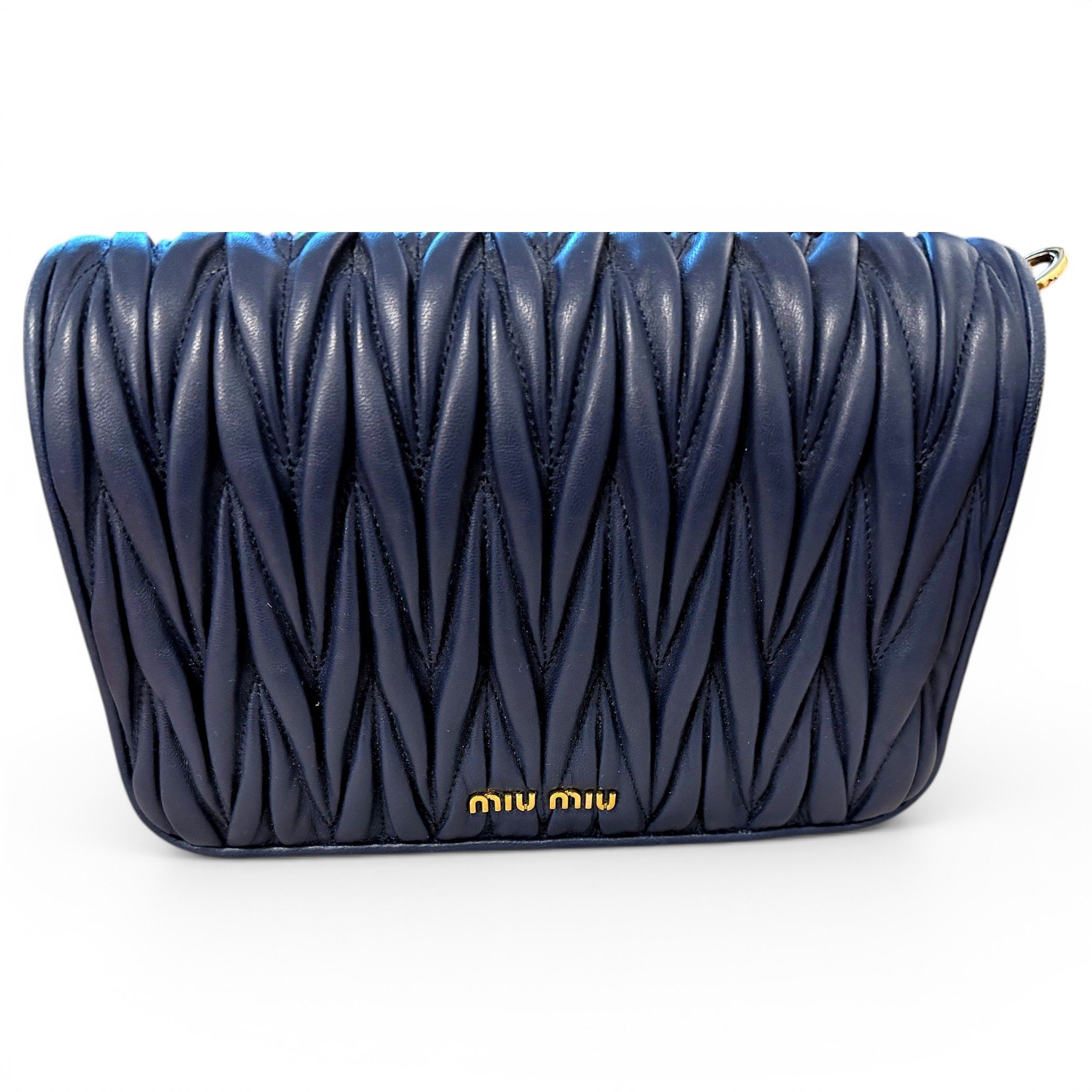 Matelassé leather clutch bag