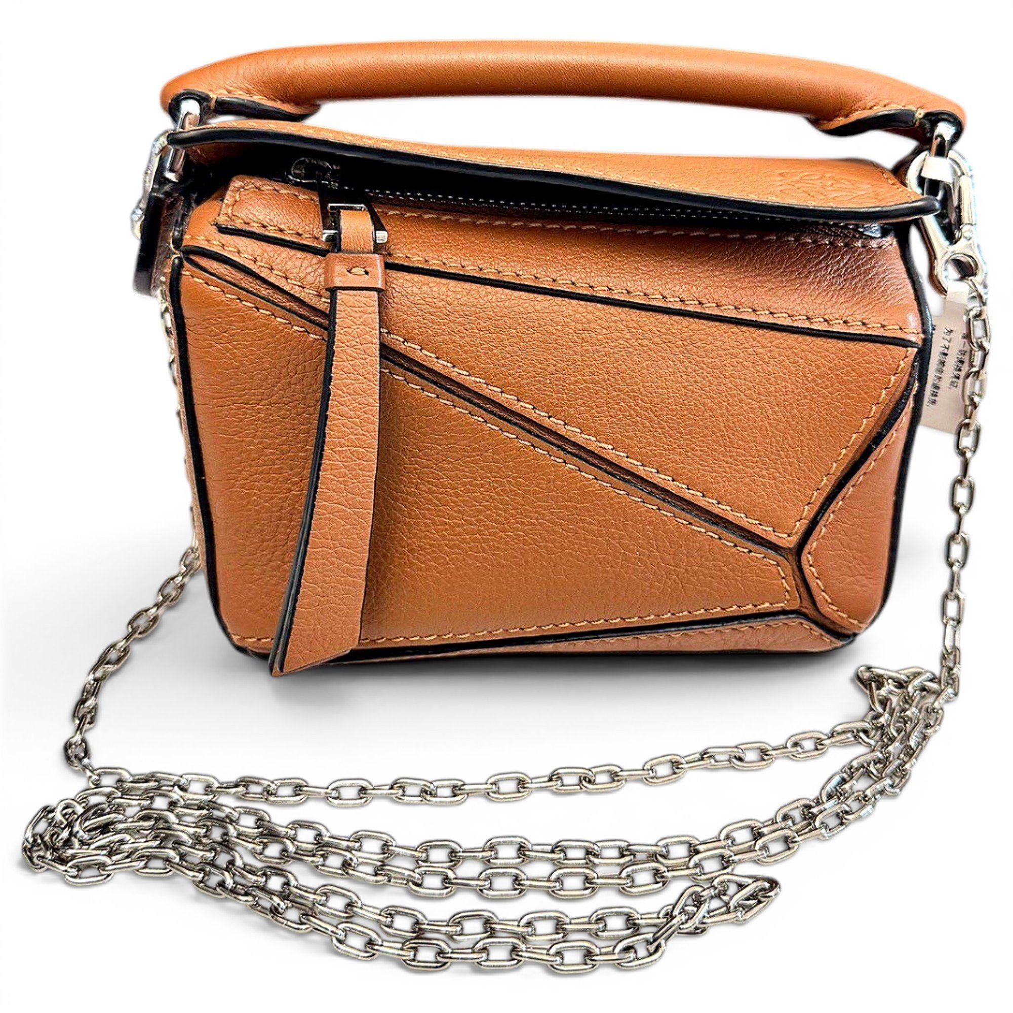 Puzzle leather handbag