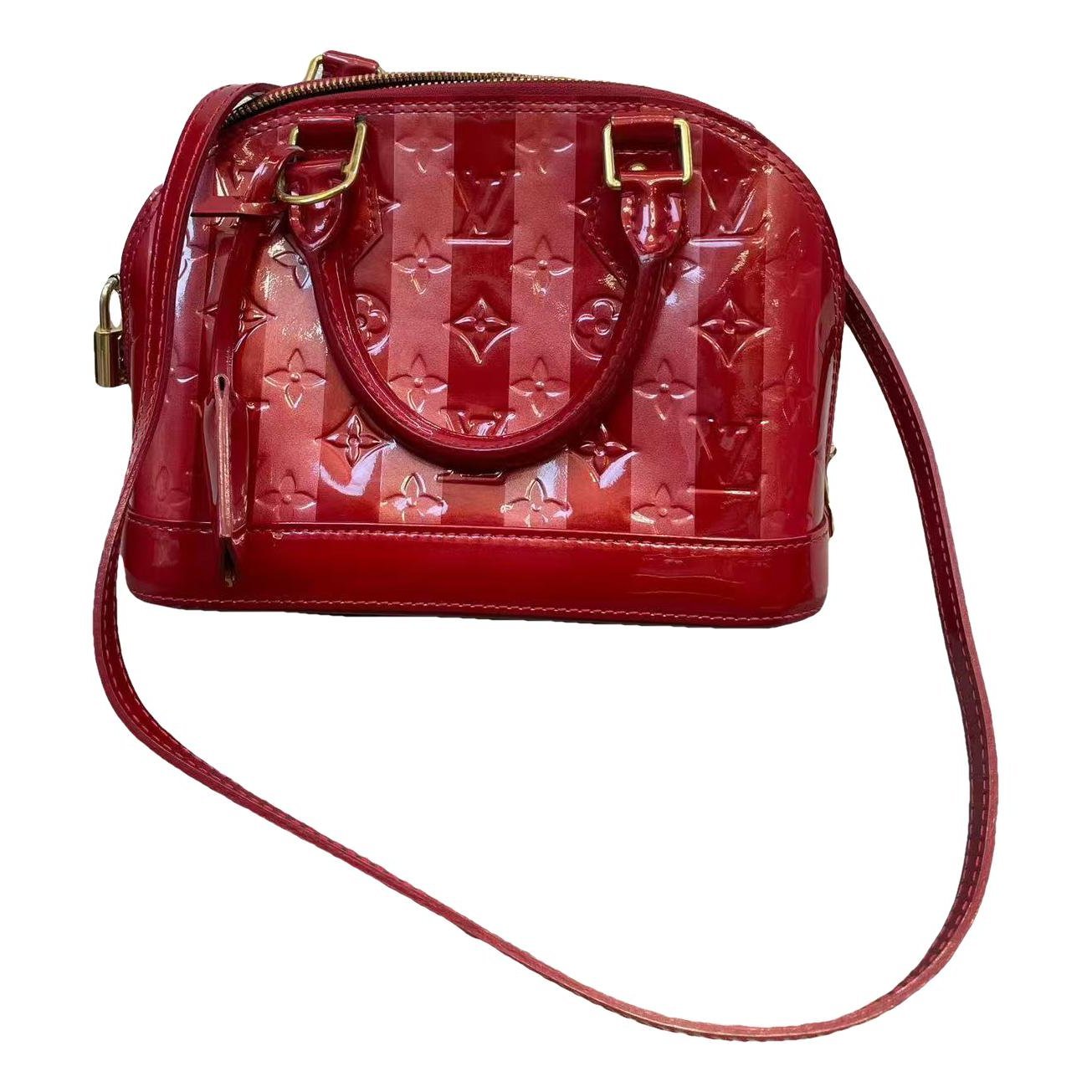 Alma BB patent leather handbag