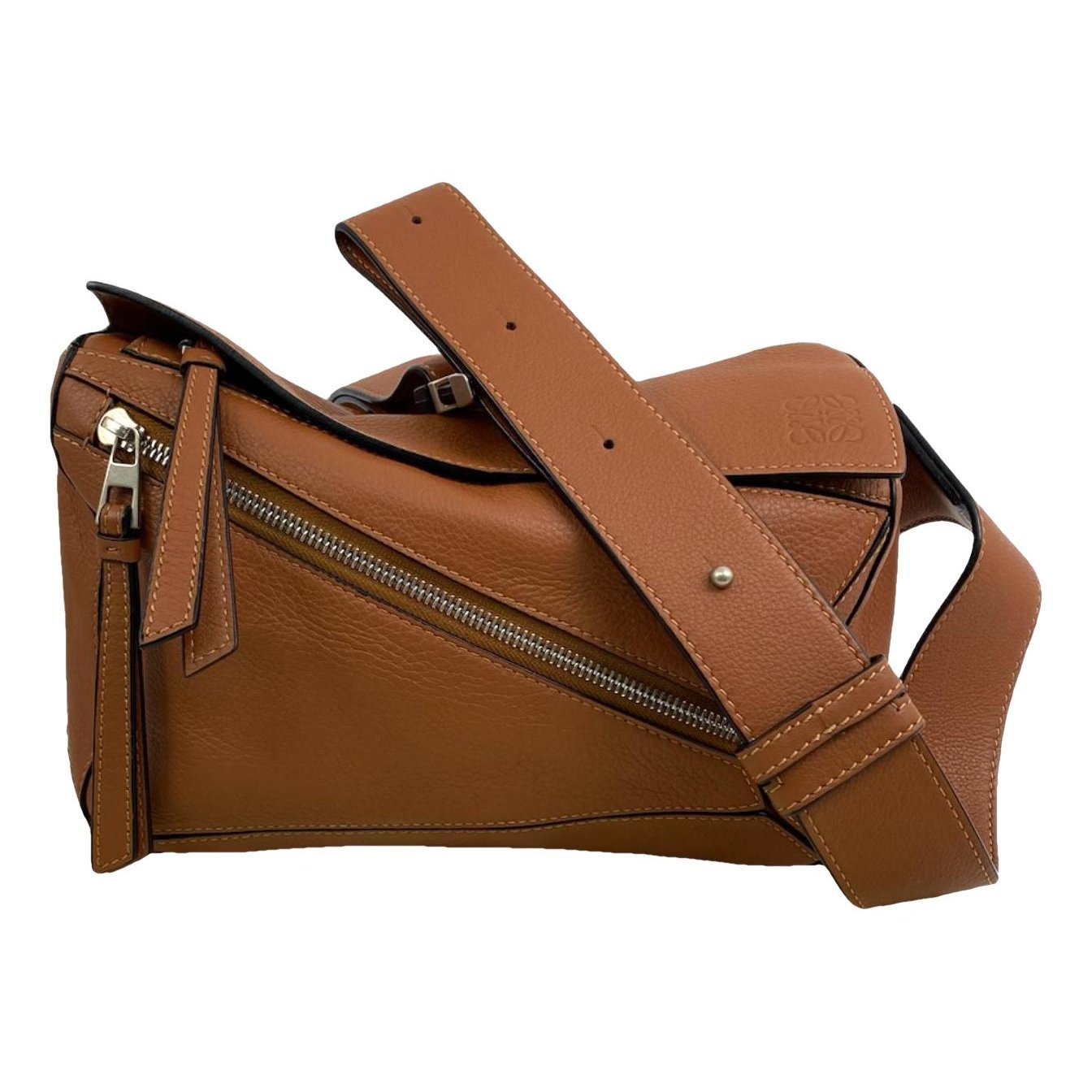 Puzzle leather handbag