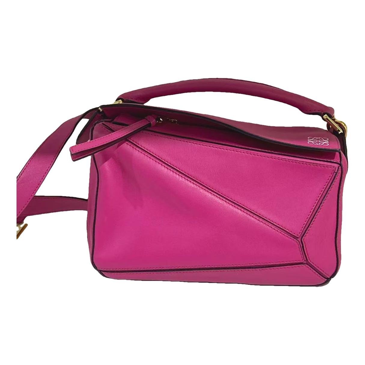 Puzzle leather handbag
