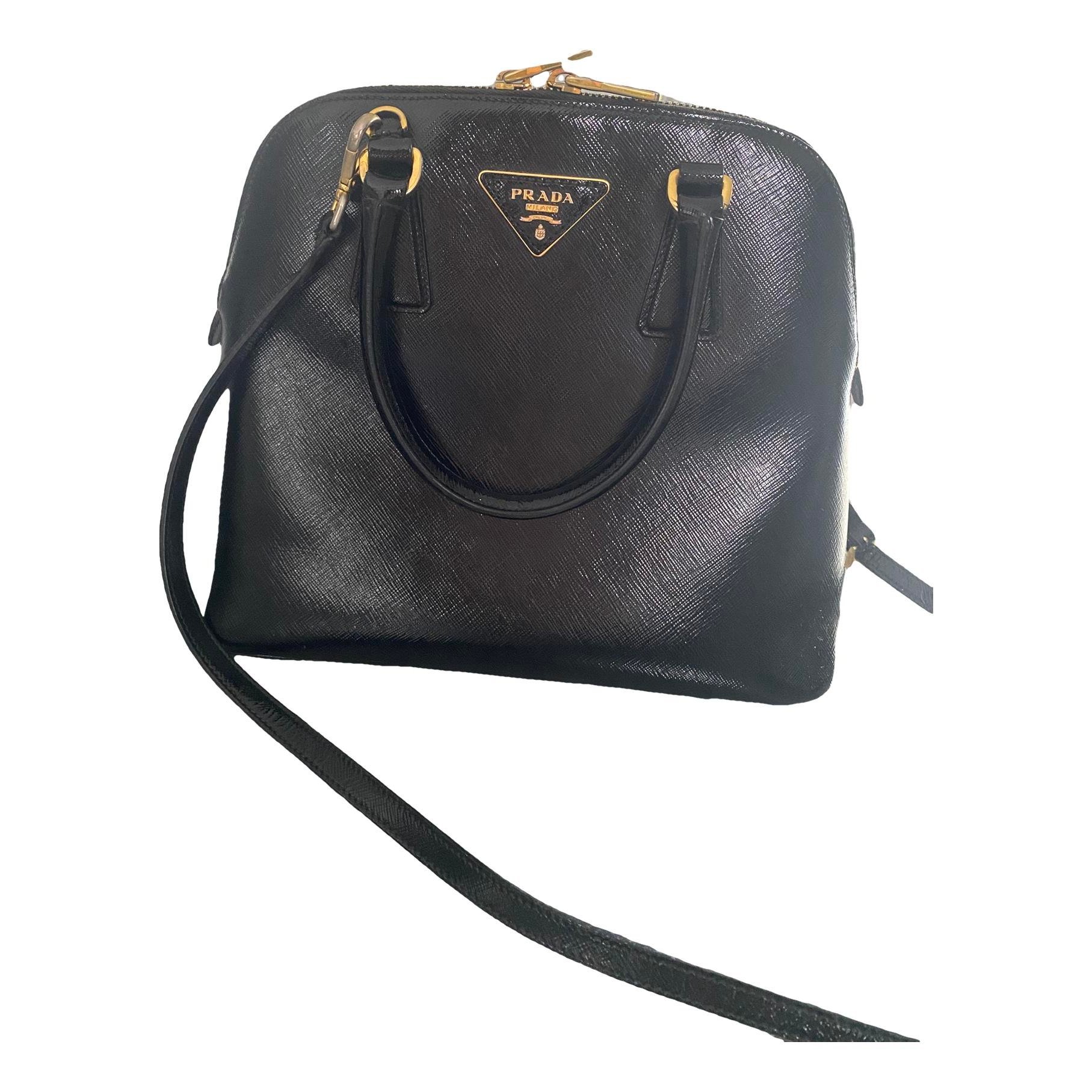 Pyramid patent leather handbag