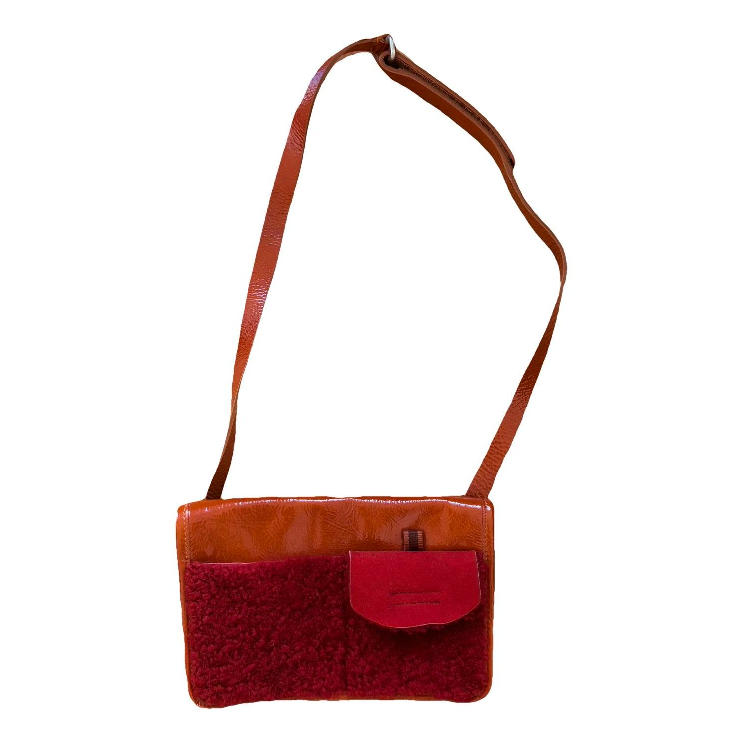 Patent leather clutch bag