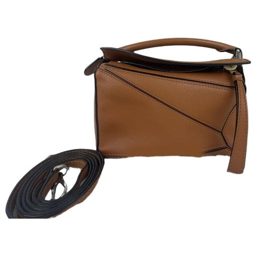 Puzzle leather handbag