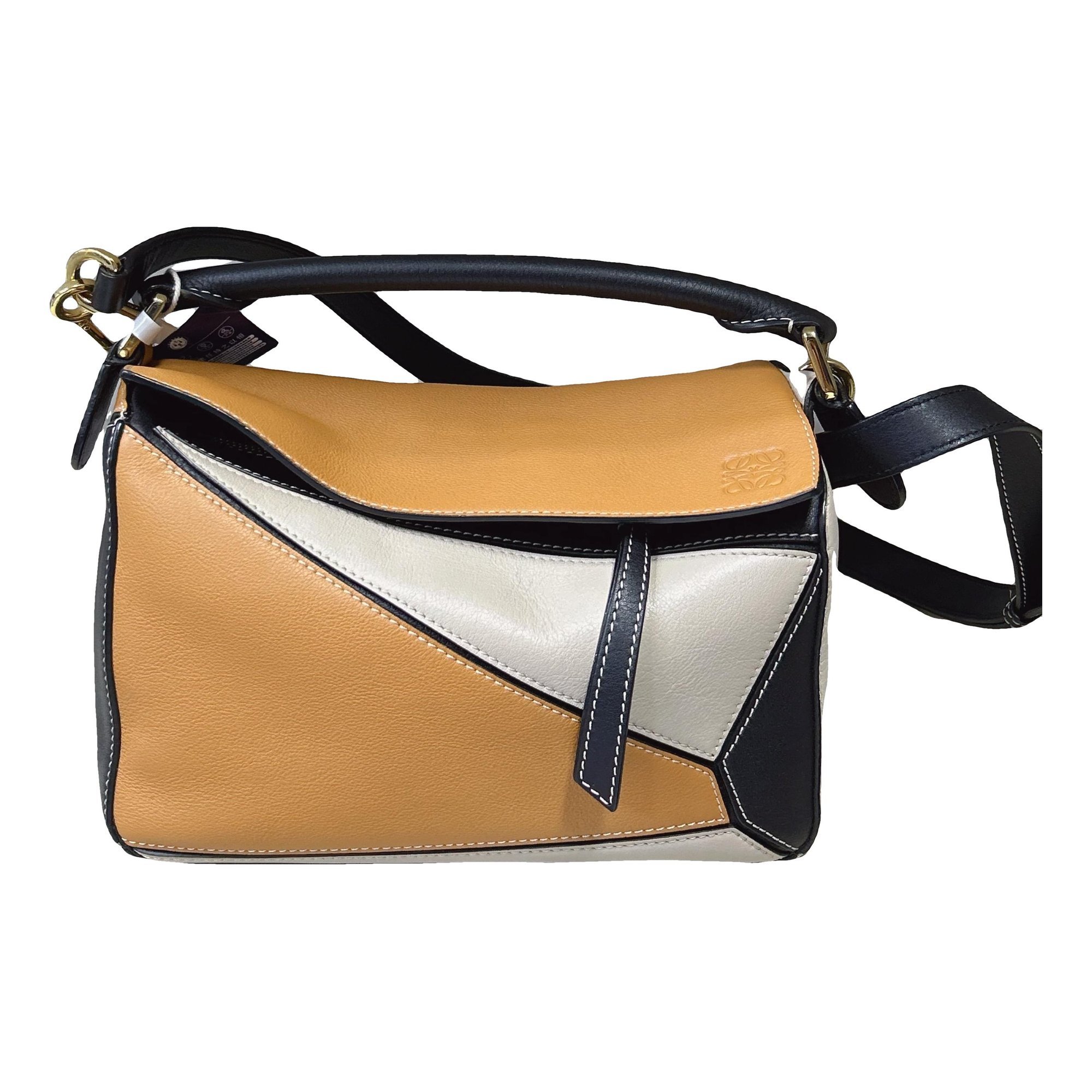 Puzzle leather handbag