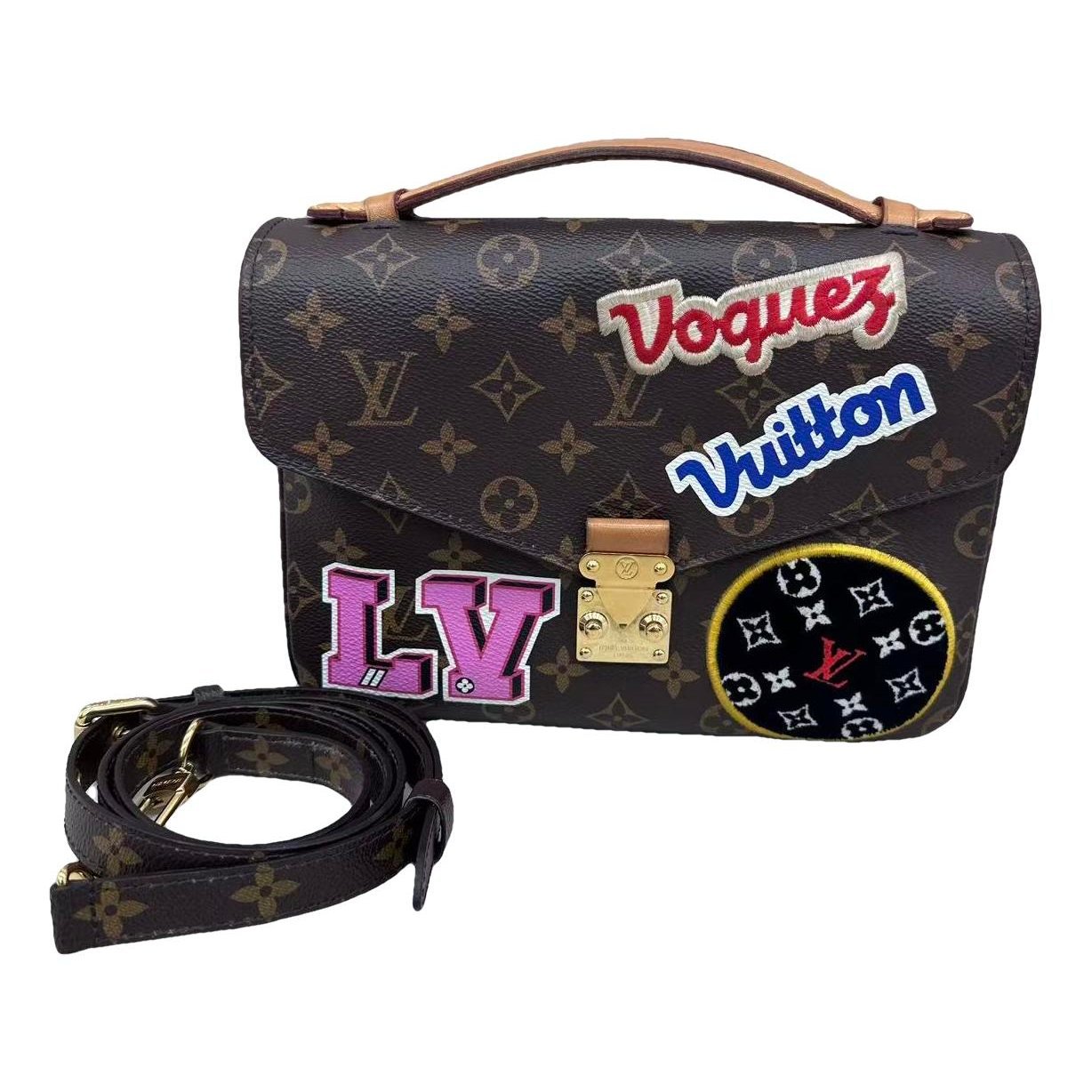 Metis leather handbag