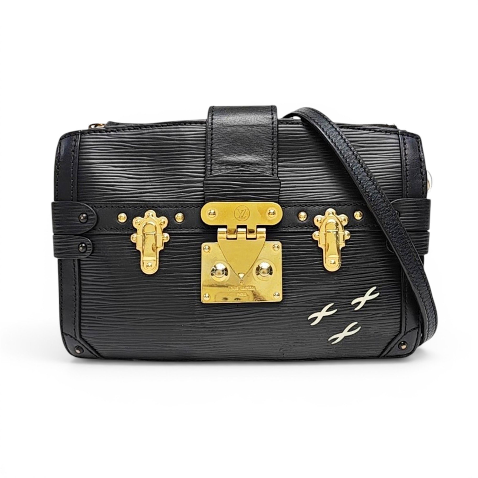 Pochette Trunk leather handbag