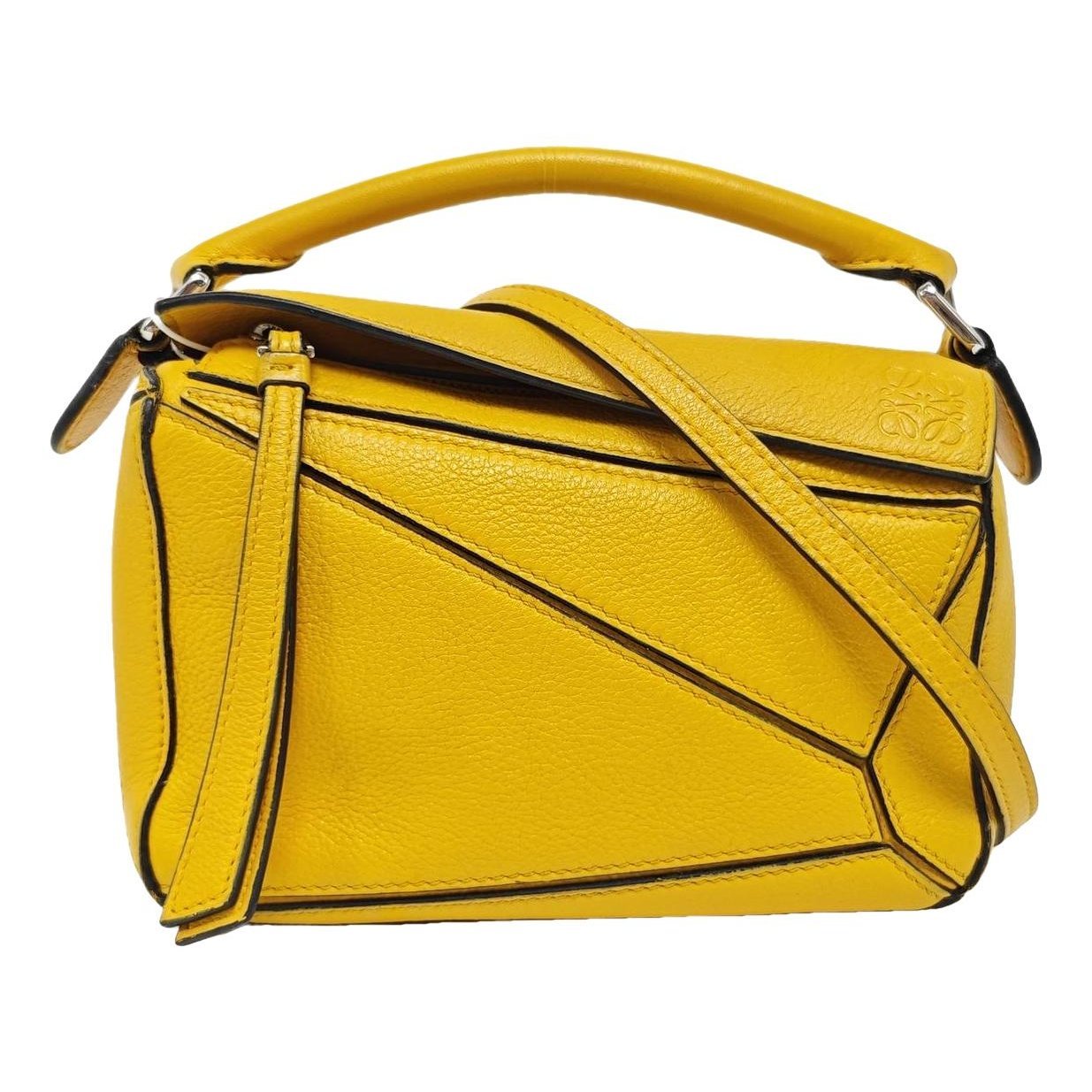 Puzzle leather handbag