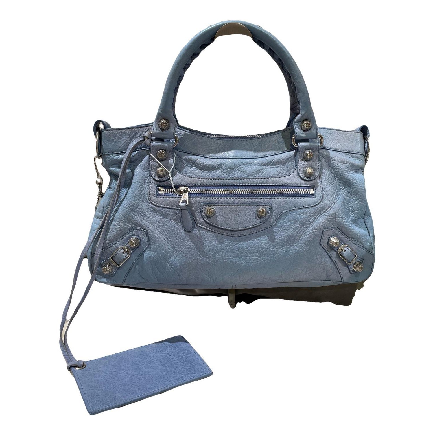 First leather handbag