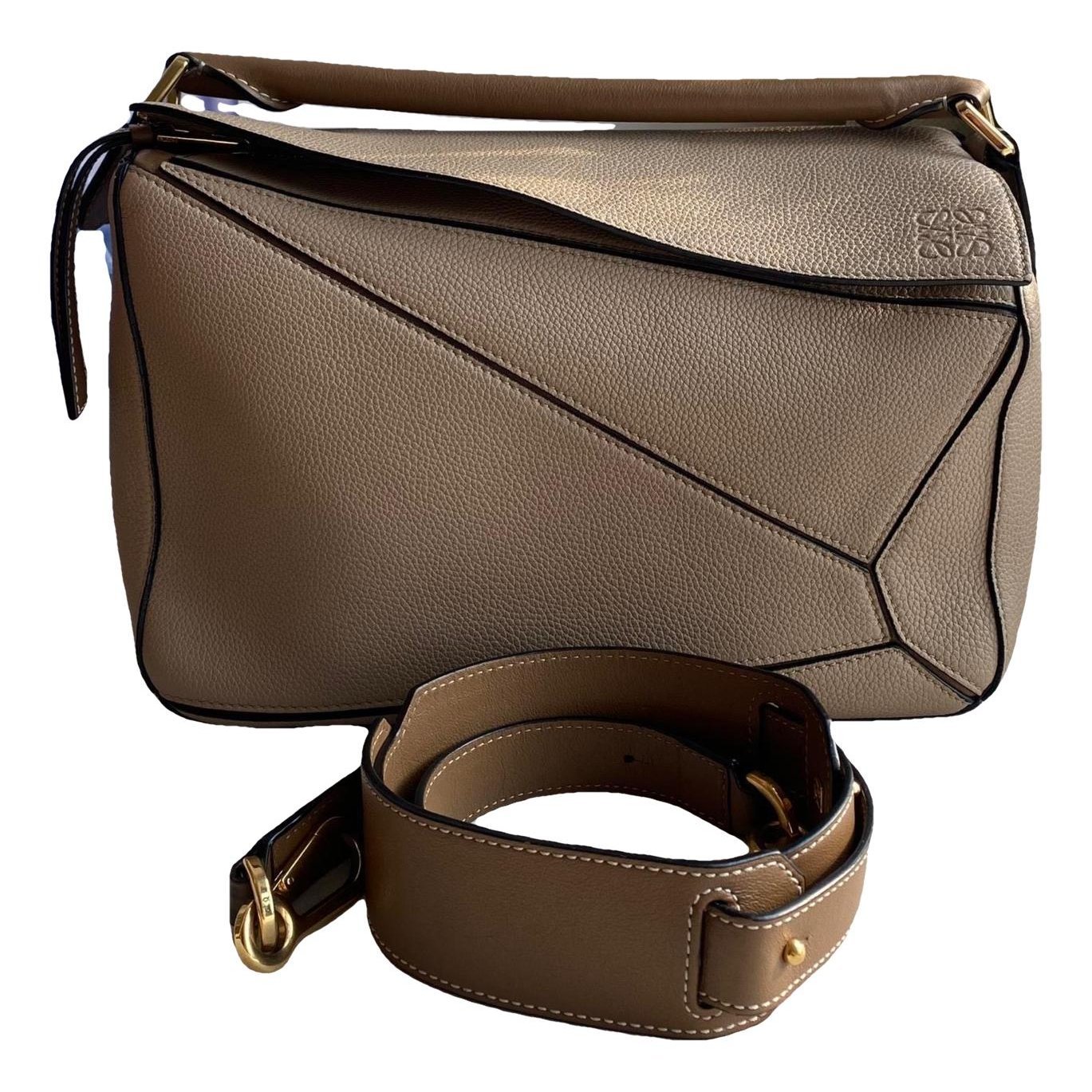 Puzzle leather handbag