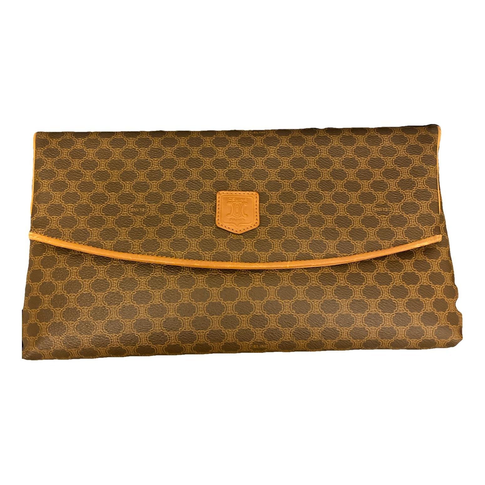 Triomphe Vintage leather clutch bag