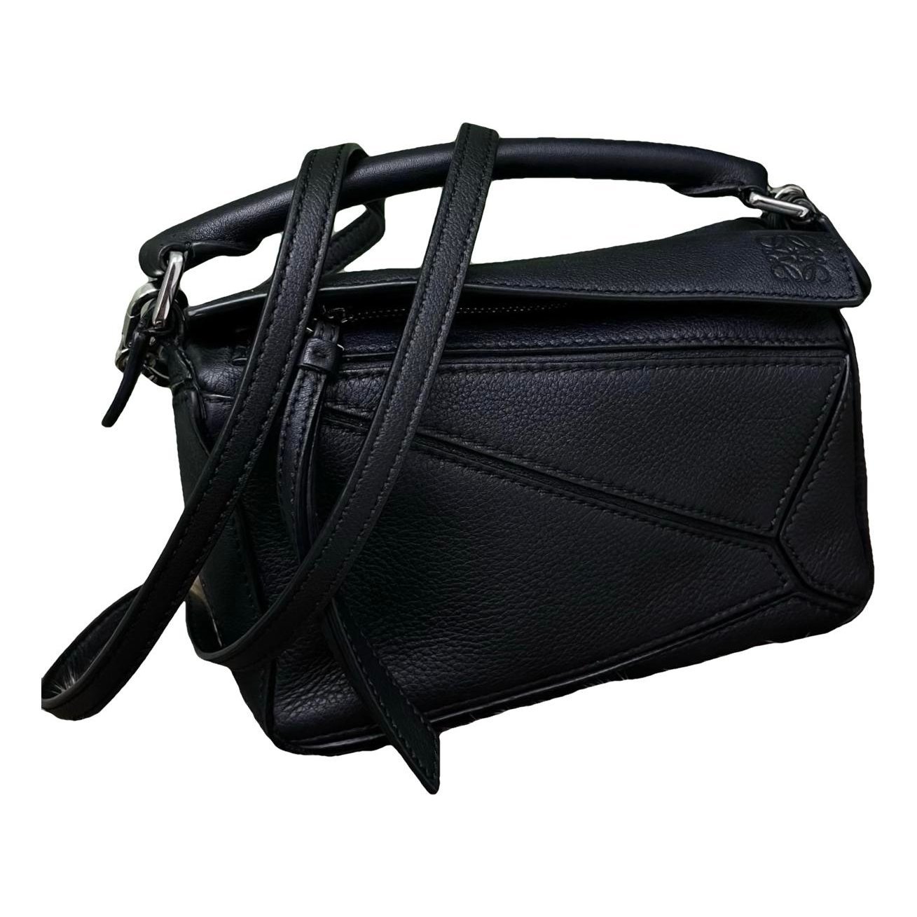 Puzzle leather handbag