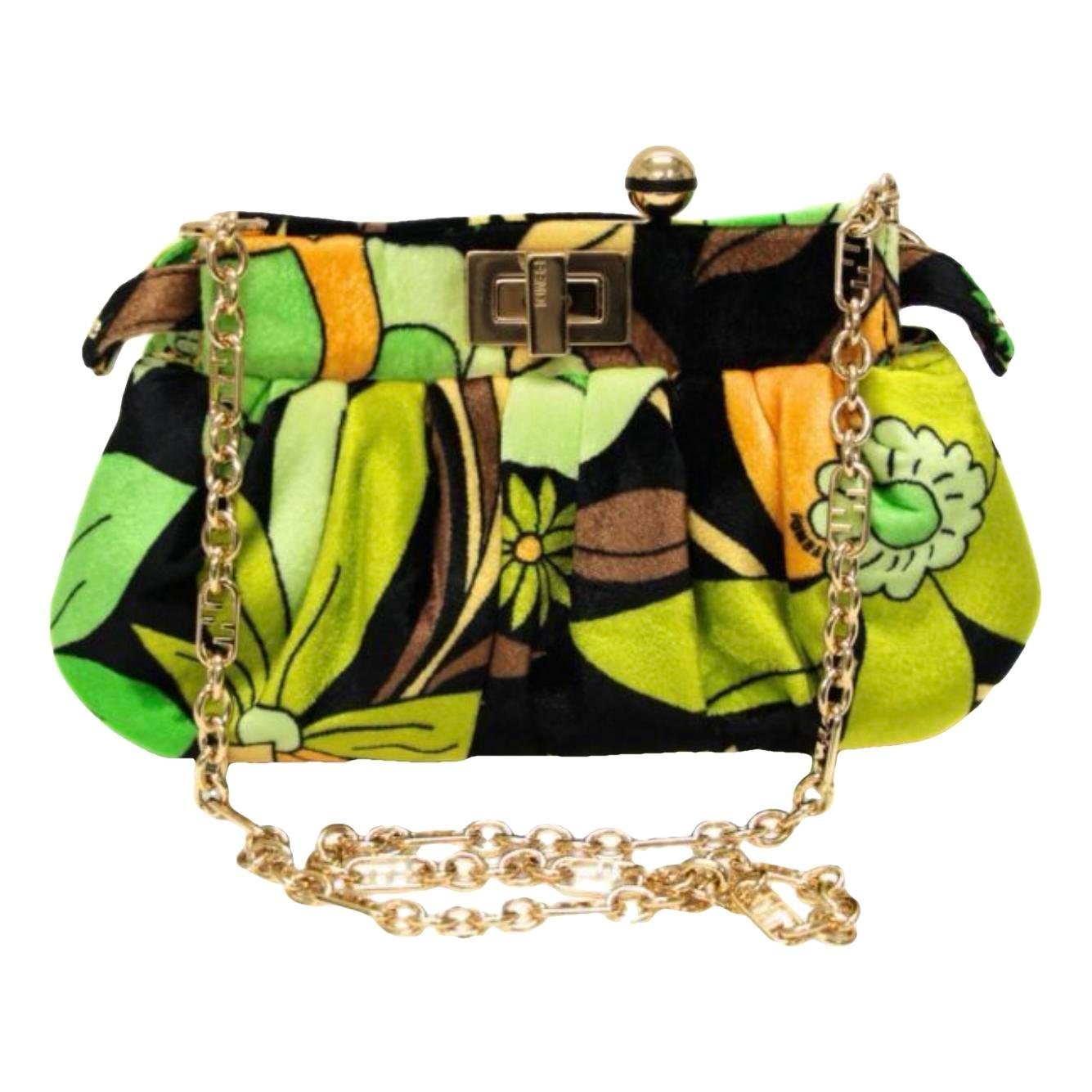 Peekaboo velvet handbag