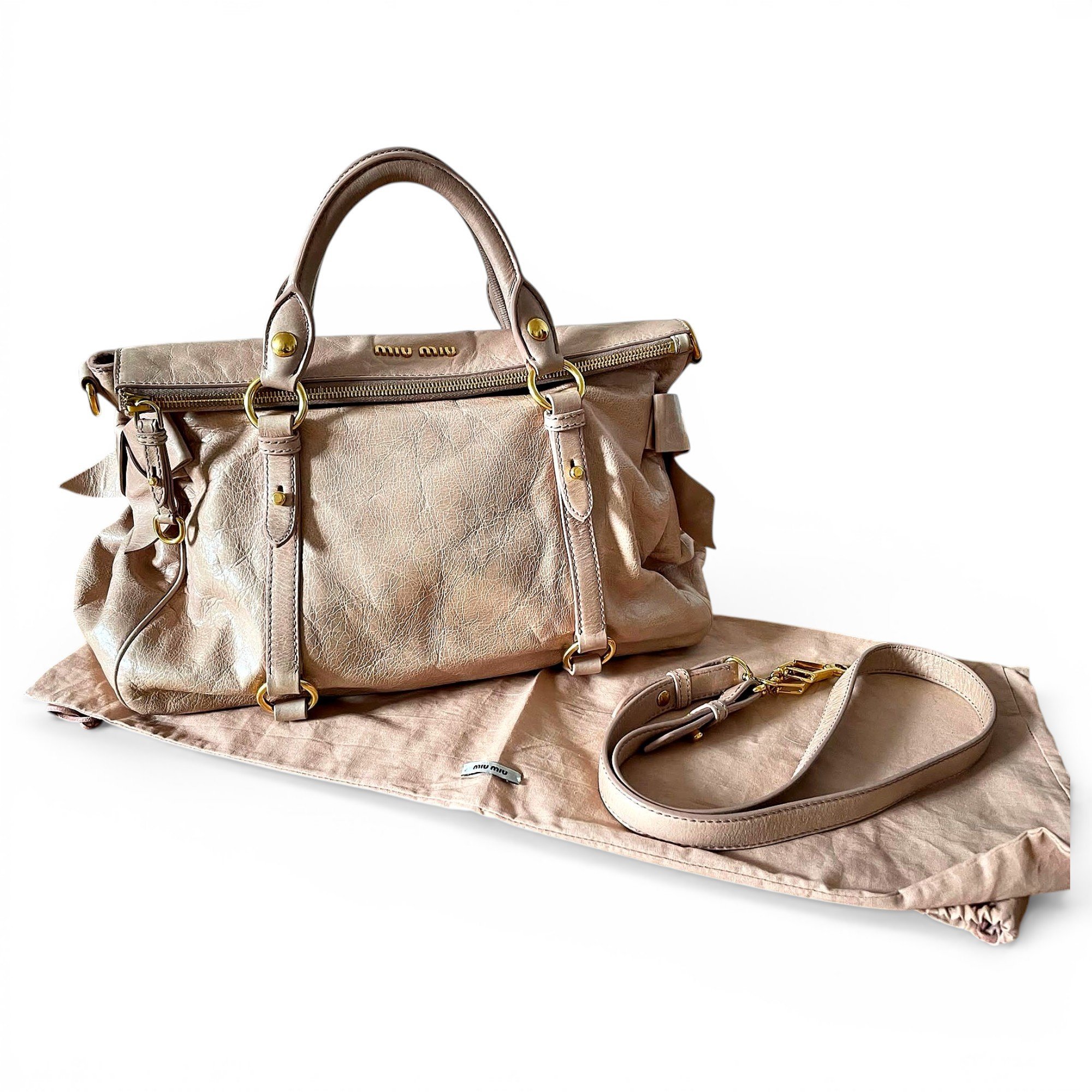 Bow bag leather handbag