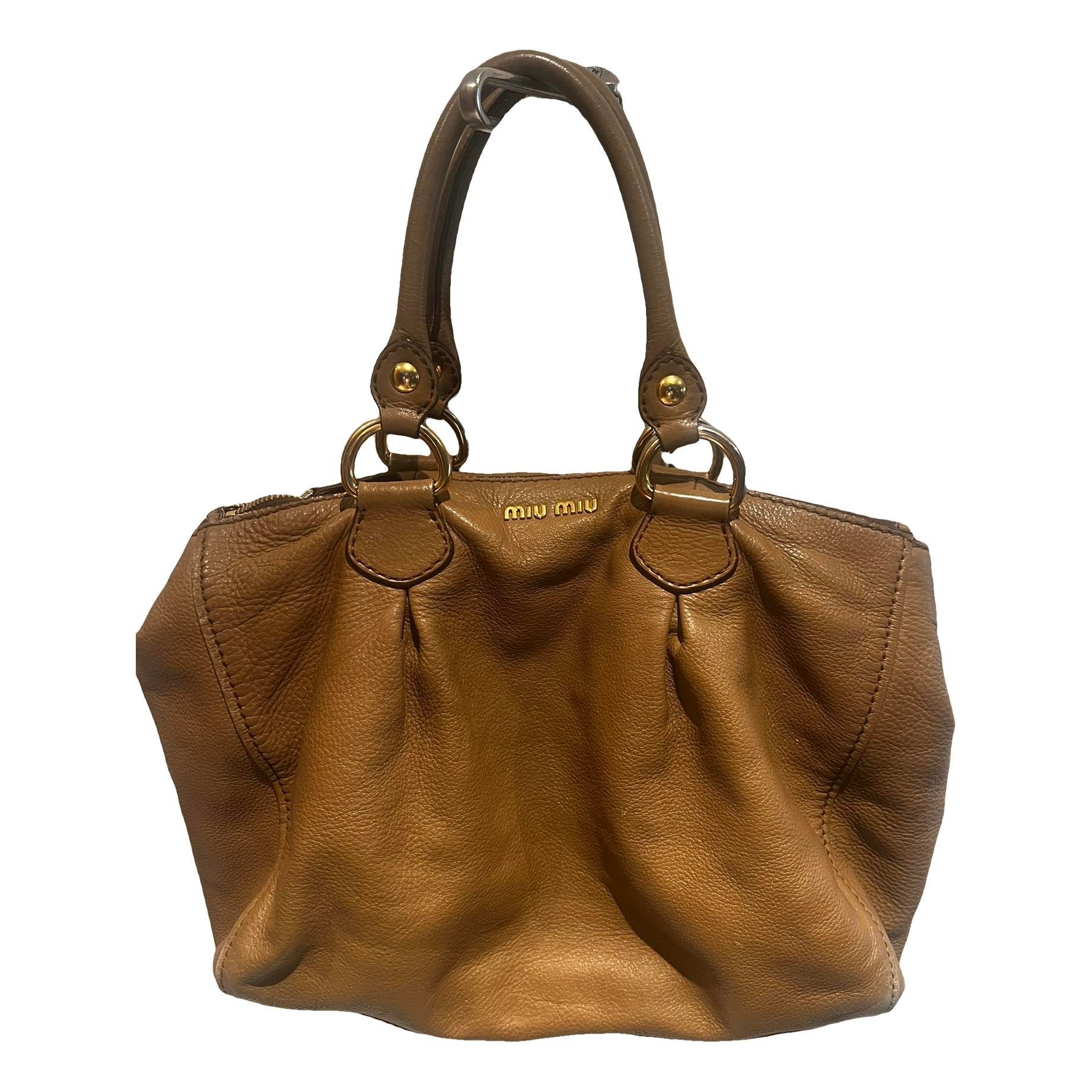 Bow bag leather handbag