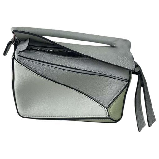 Puzzle leather handbag