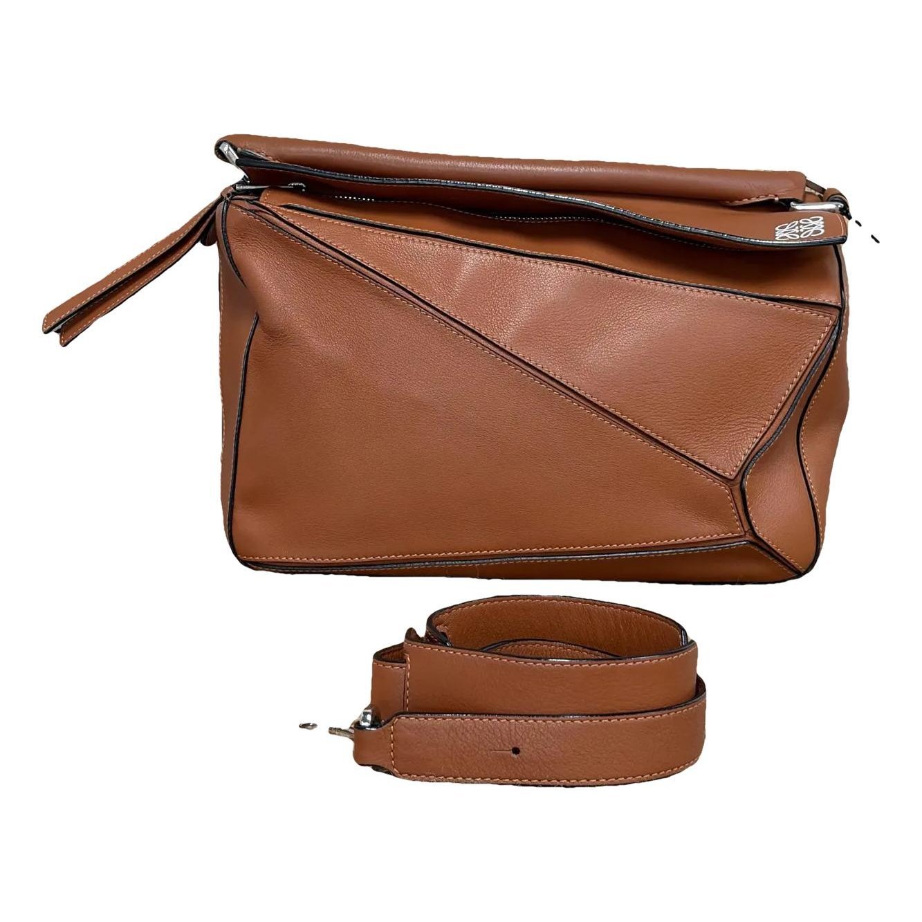 Puzzle leather handbag