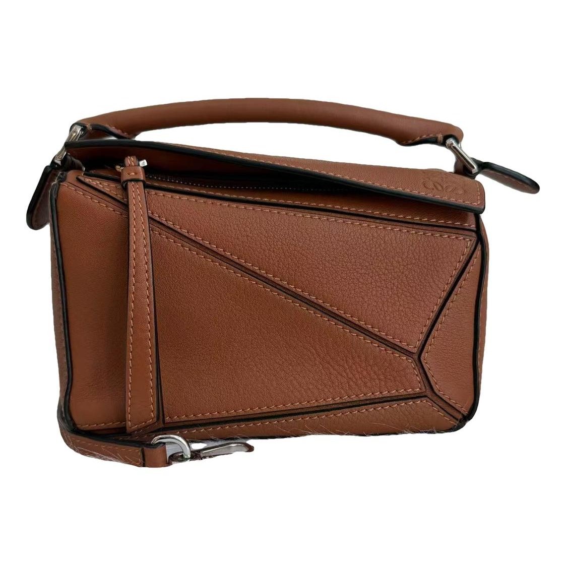 Puzzle leather handbag