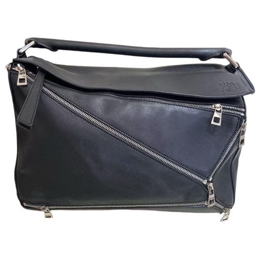 Puzzle leather handbag