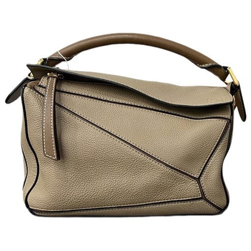 Puzzle leather handbag