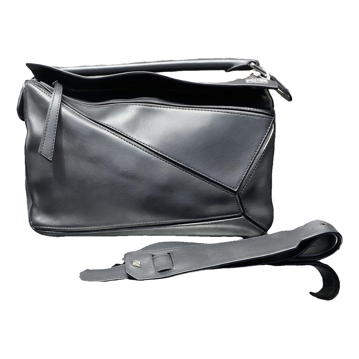 Puzzle leather handbag