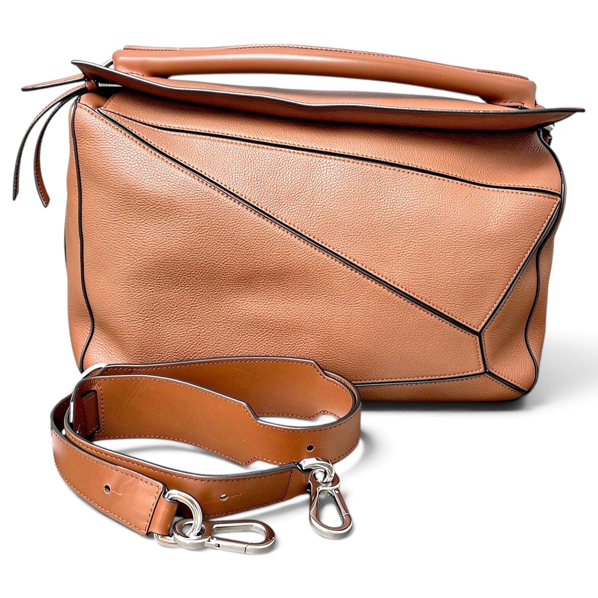 Puzzle leather handbag