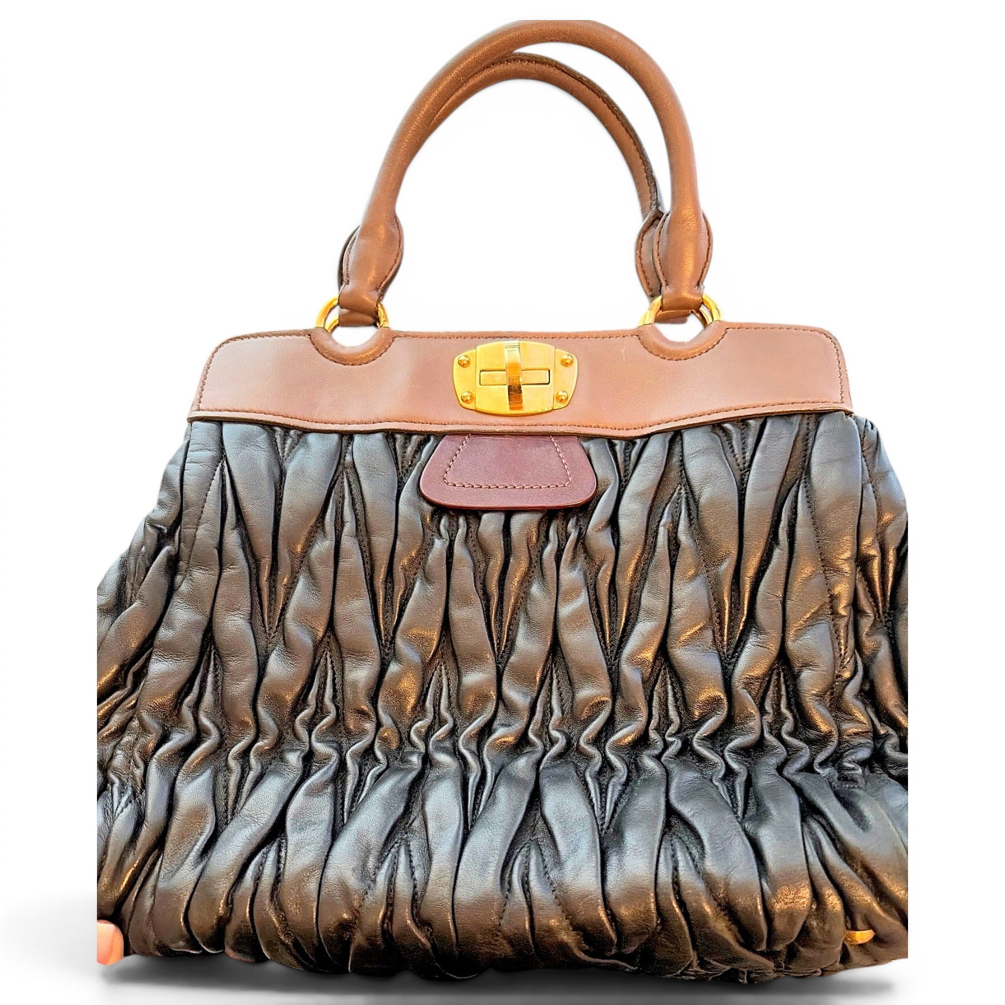 Matelassé leather handbag