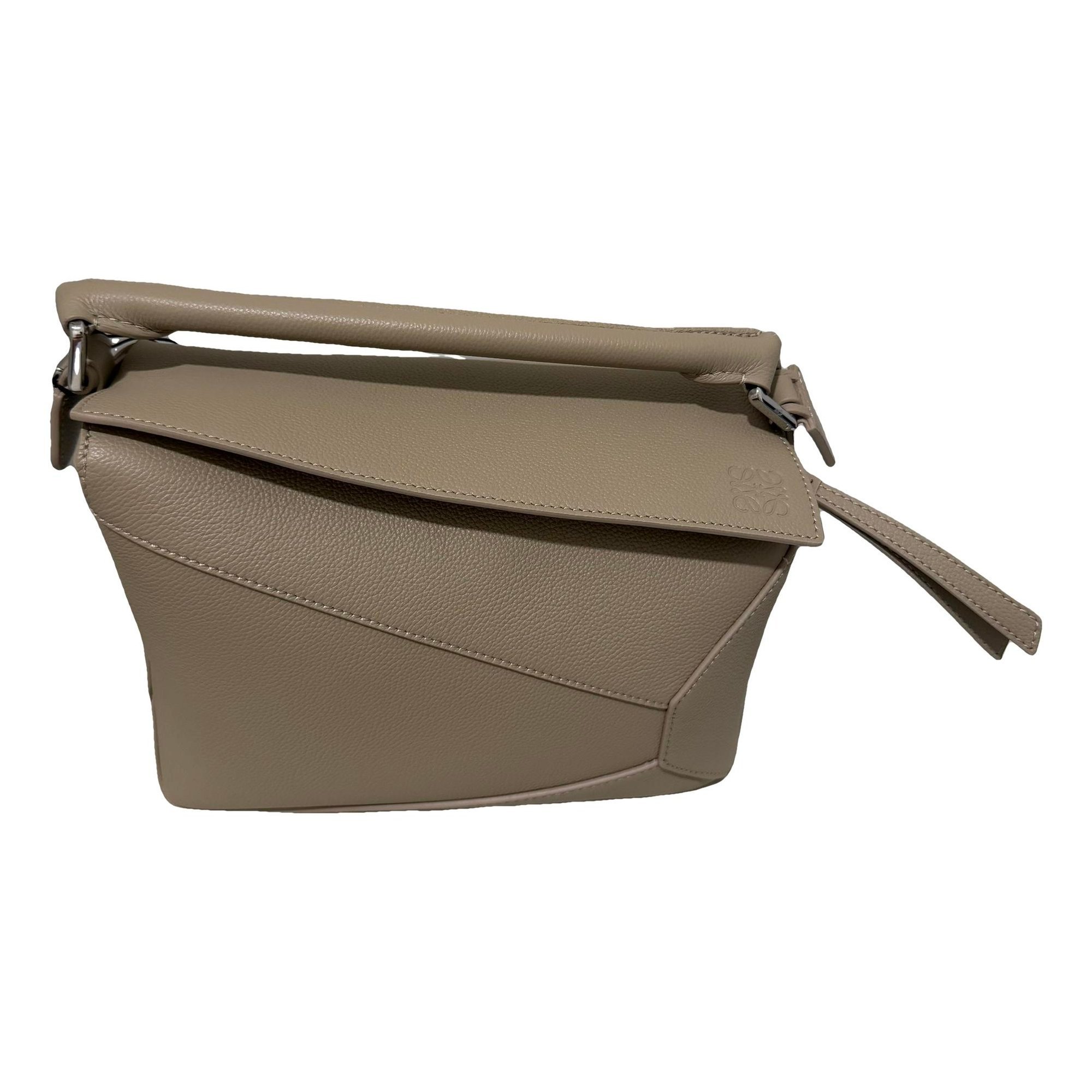 Puzzle leather handbag