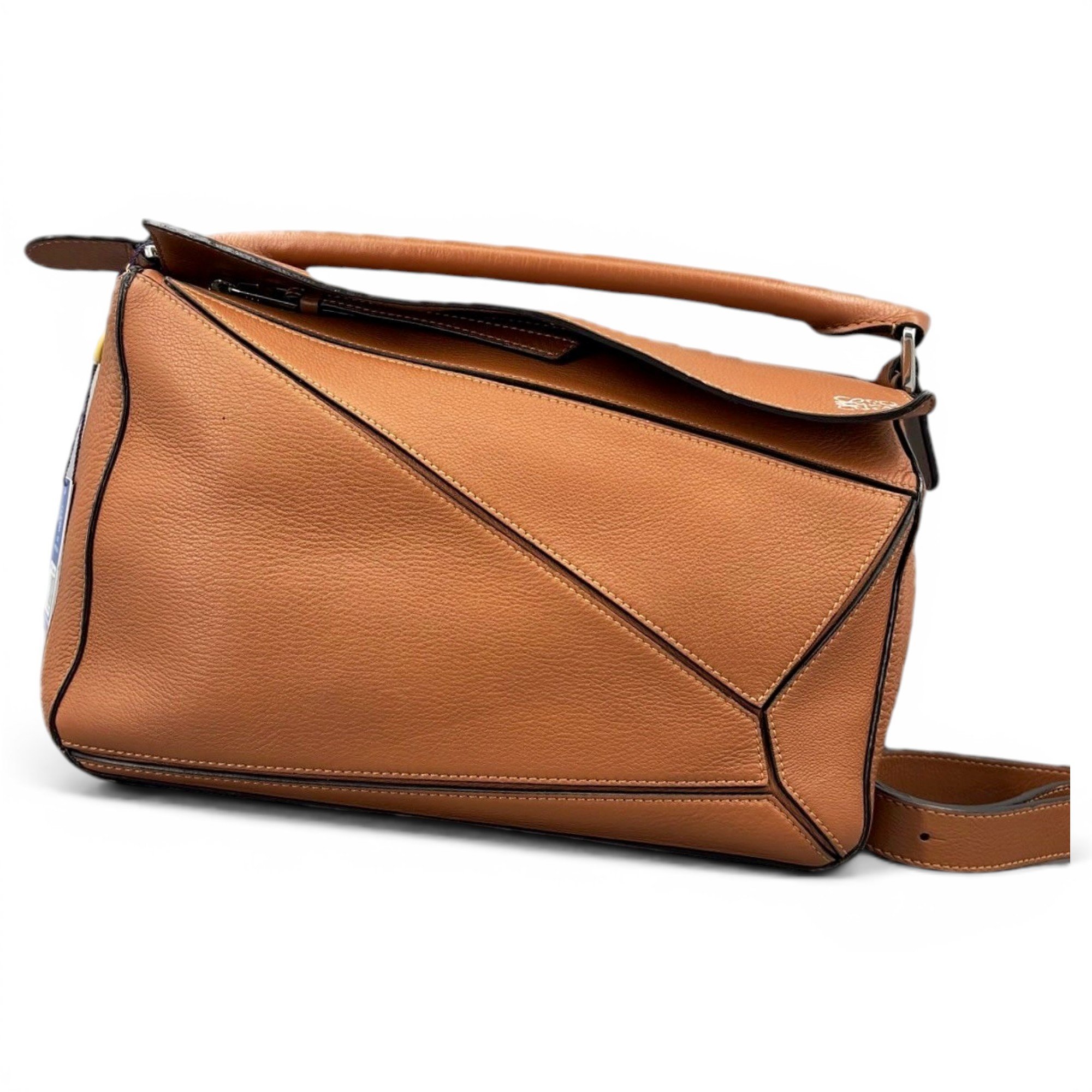 Puzzle leather handbag
