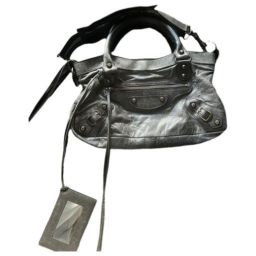 First leather handbag
