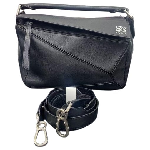 Puzzle leather handbag