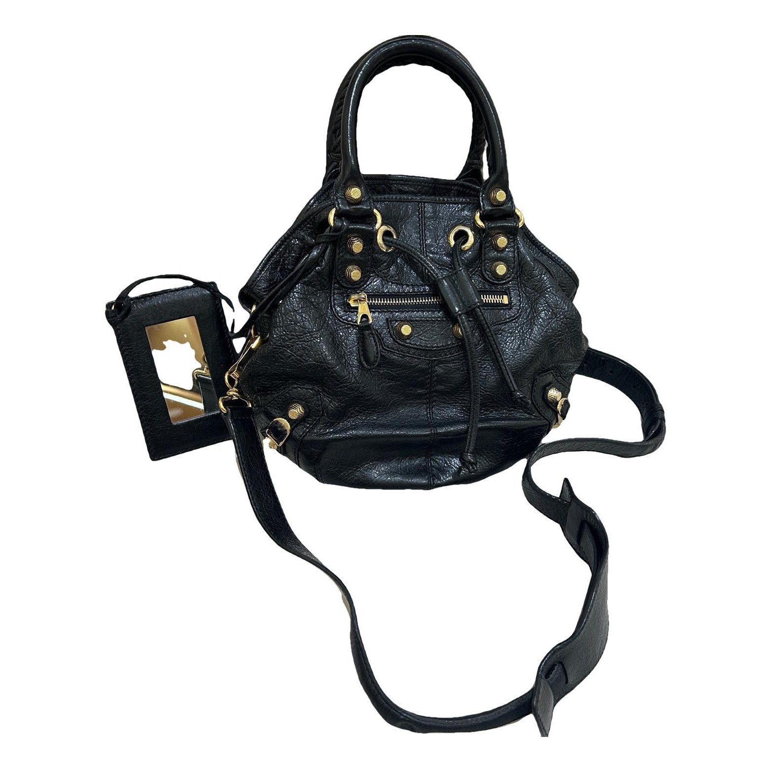 Pompon leather handbag