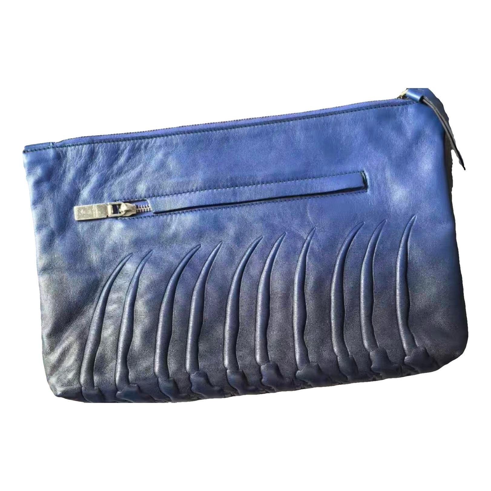 Alexander McQueen Leather clutch bag