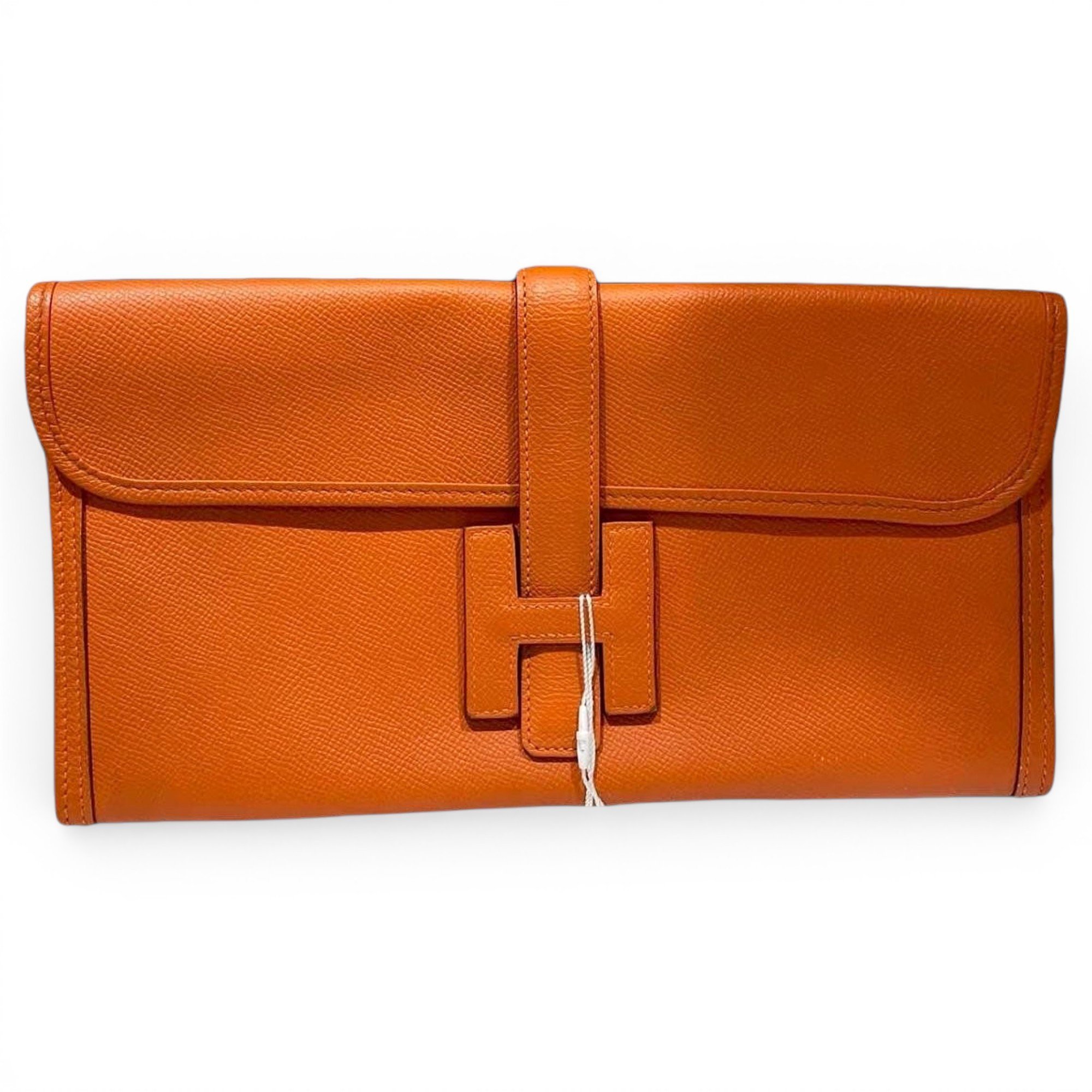 Jige leather clutch bag