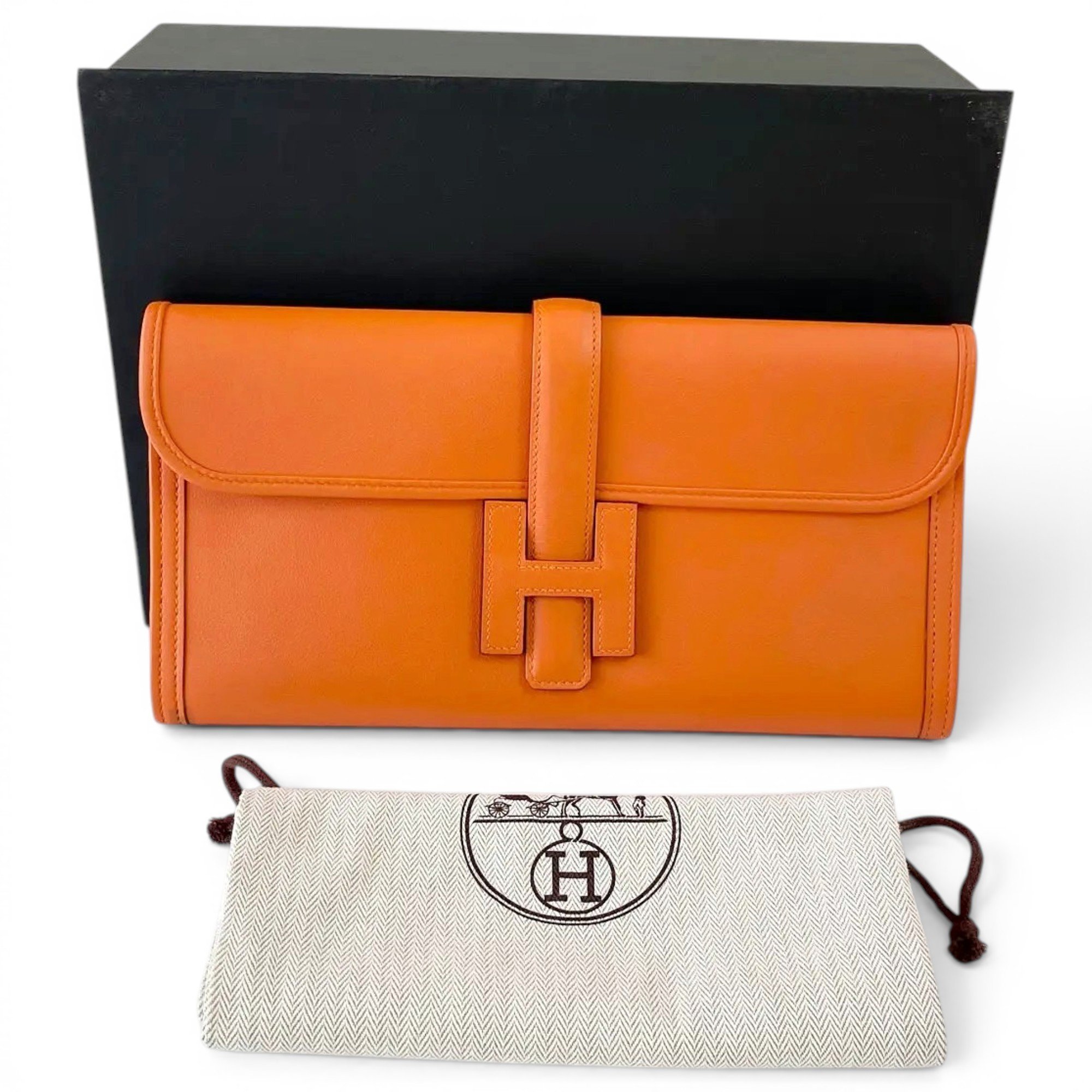Jige leather clutch bag