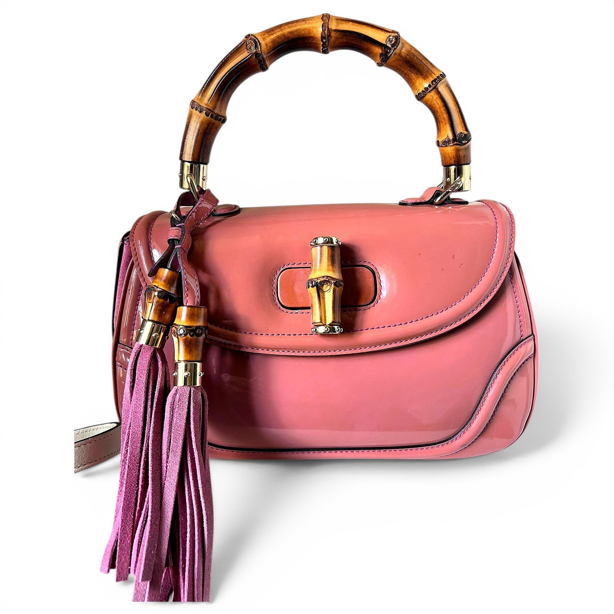 Convertible Pompon Bamboo Top Handle patent leather handbag
