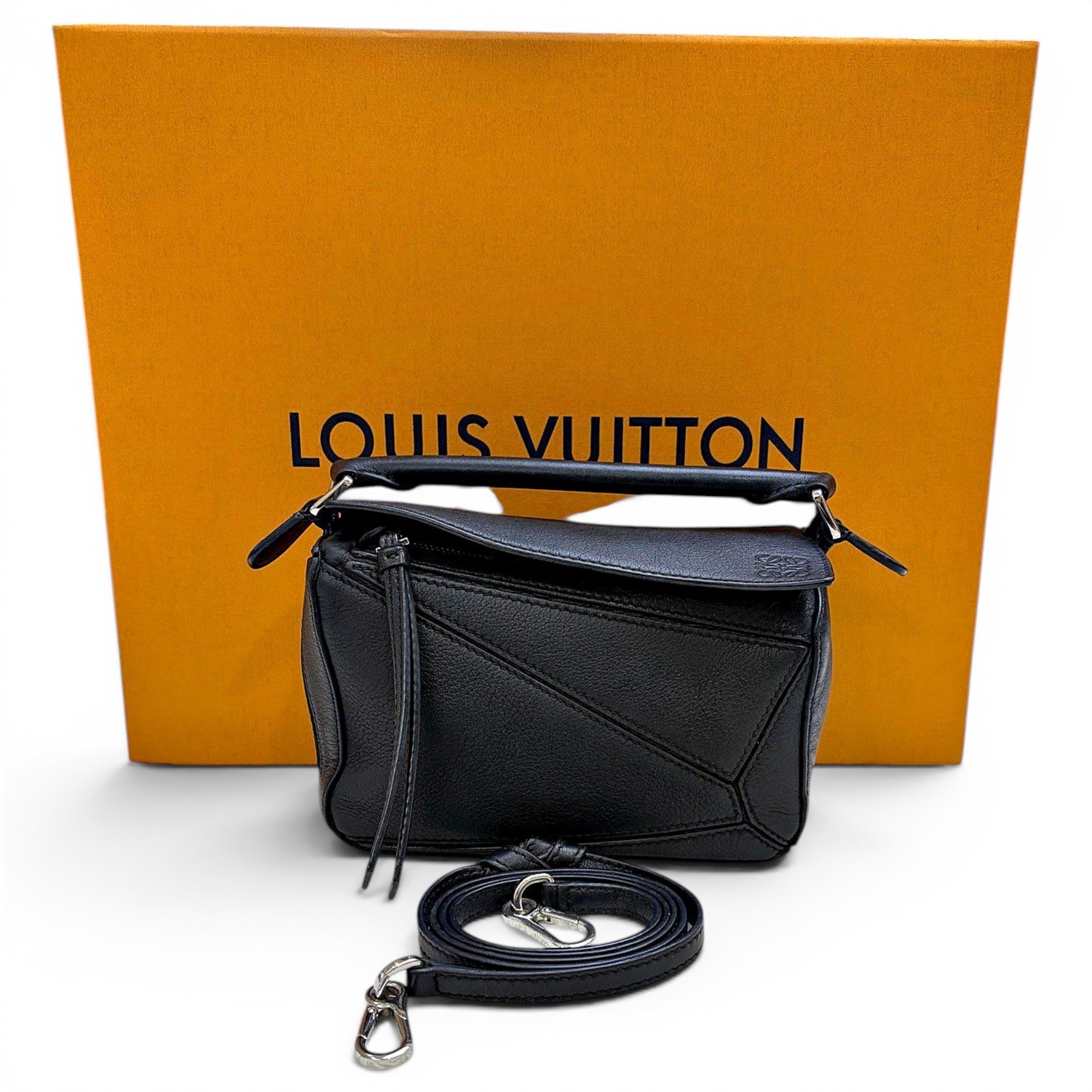 Puzzle leather handbag