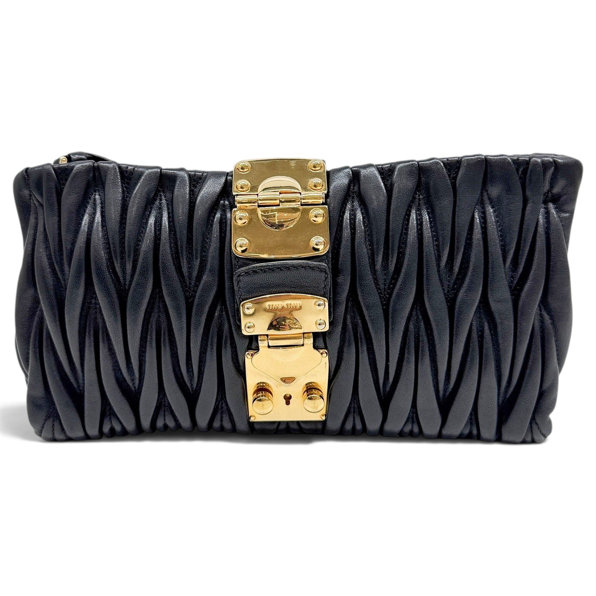 Matelassé leather clutch bag