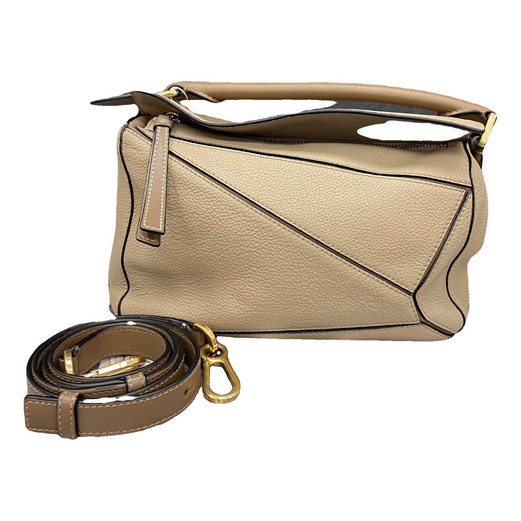 Puzzle leather handbag