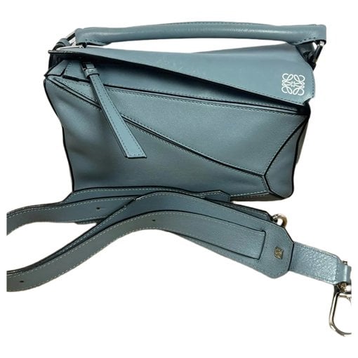 Puzzle leather handbag
