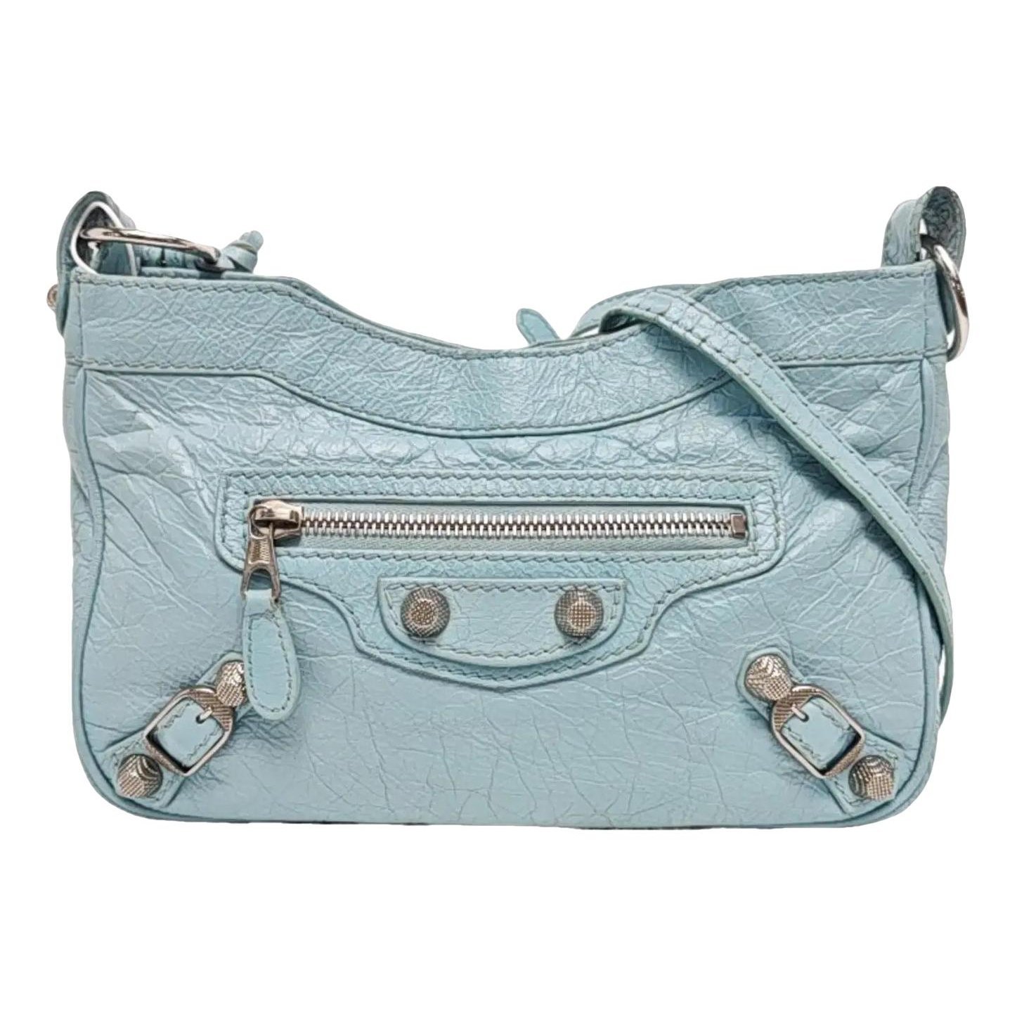 Hip leather handbag
