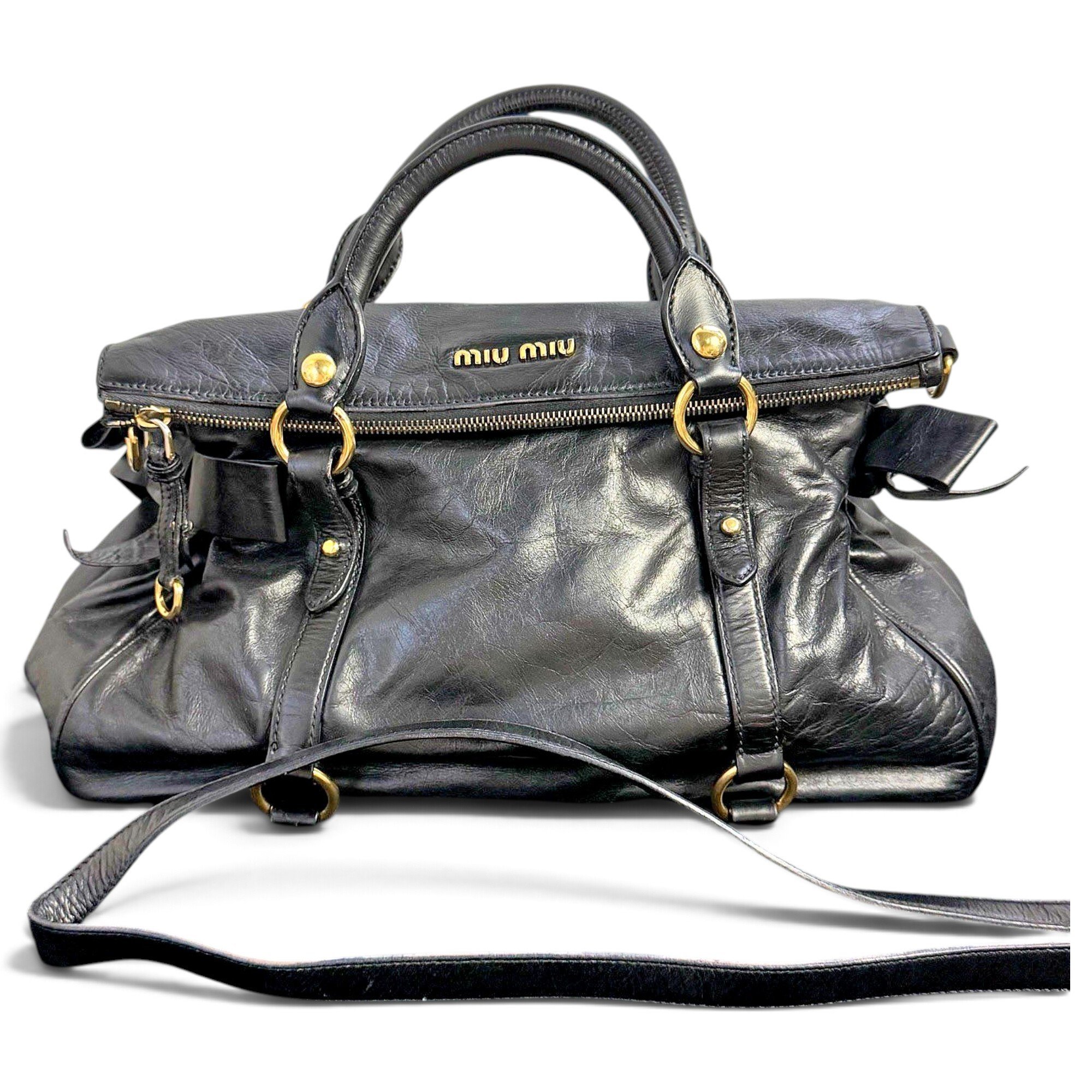Bow bag leather handbag