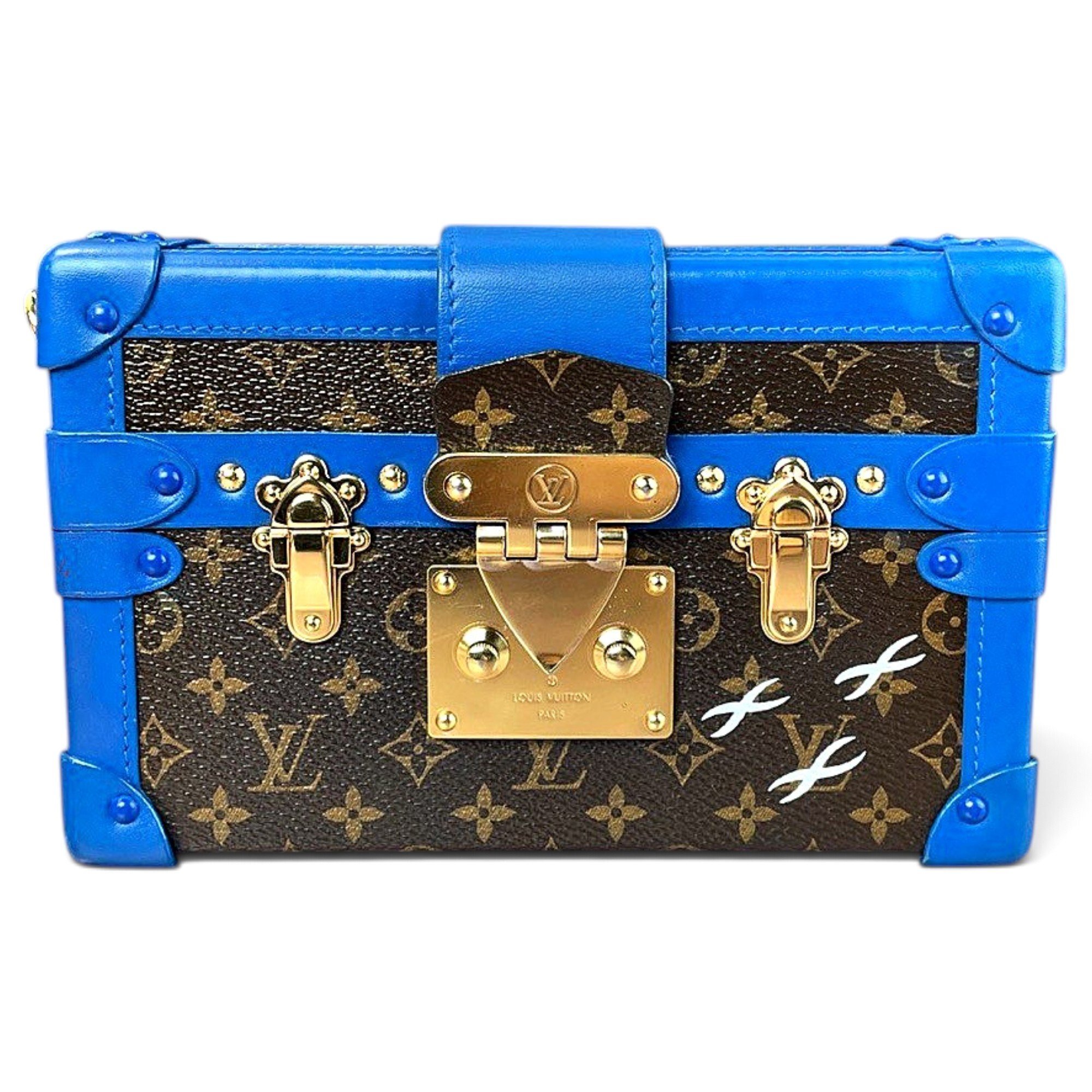 Pochette Trunk leather handbag