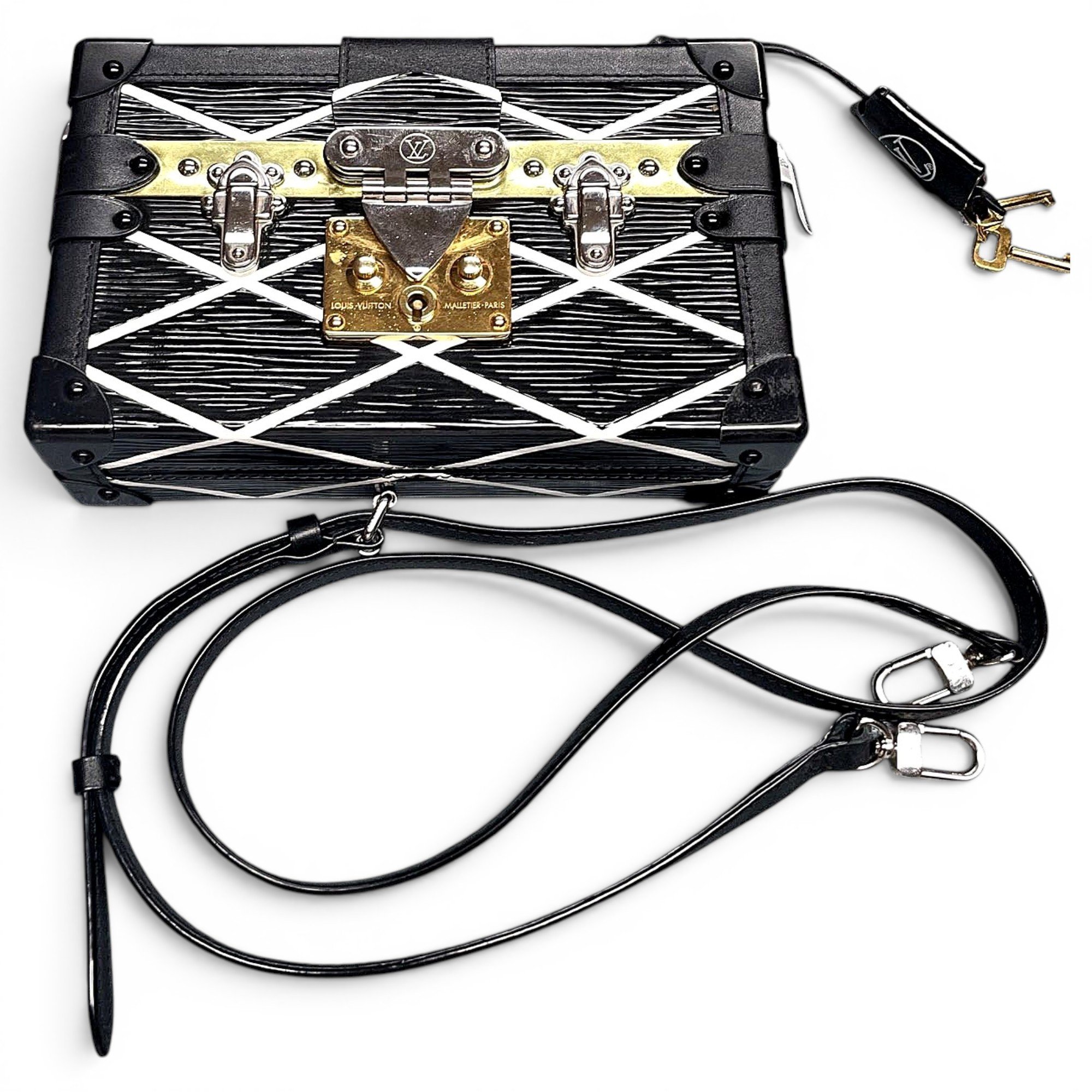 Pochette Trunk leather handbag