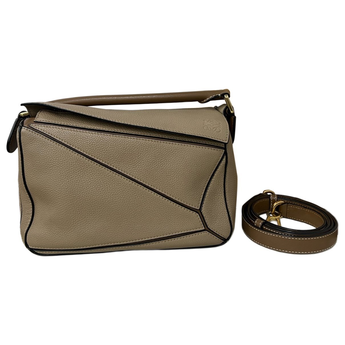 Puzzle leather handbag