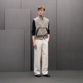Vest with leather details	
